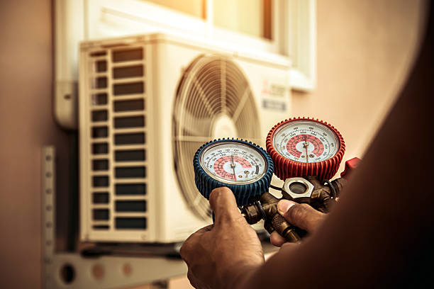 Professional Heat Pump Repair technician working in Hialeah, FL